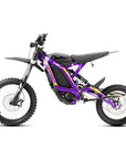 Bright purple TE dirt ebike full side profile view lightweight off-road electric motorcycle for trail riding