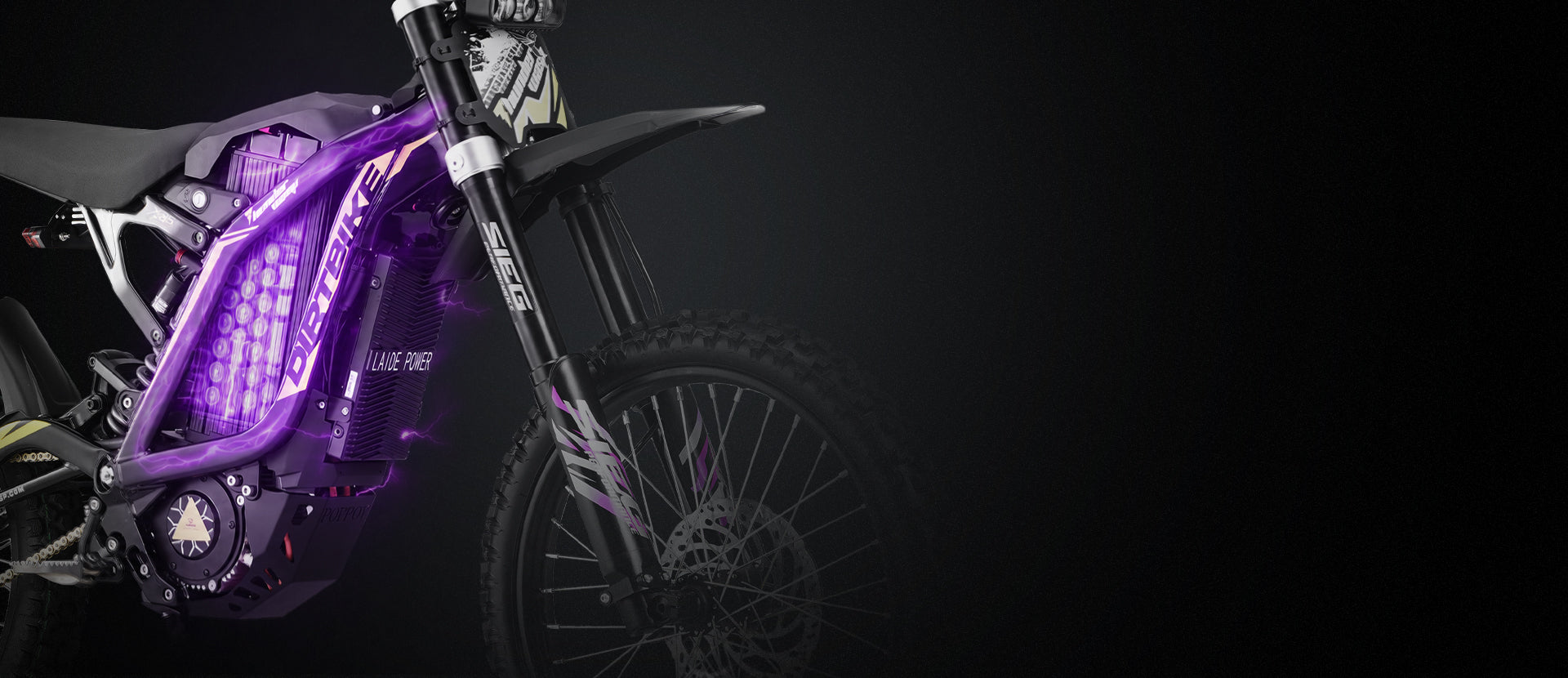 Detailed close-up shot of X10 dirt ebike large 72V 35Ah removable lithium battery for long offroad riding