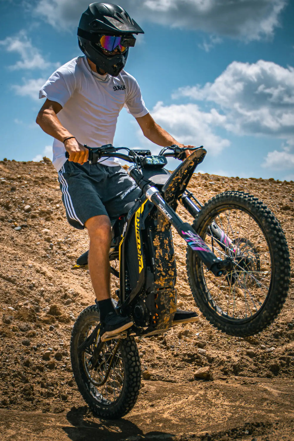 Dynamic jump stunt of XR16 electric dirt bike with pro-tuned adjustable suspension on offroad dirt track